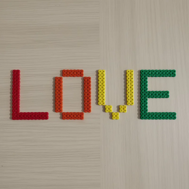 LOVE sign beaded in fuse beads, 58x29 pegs
