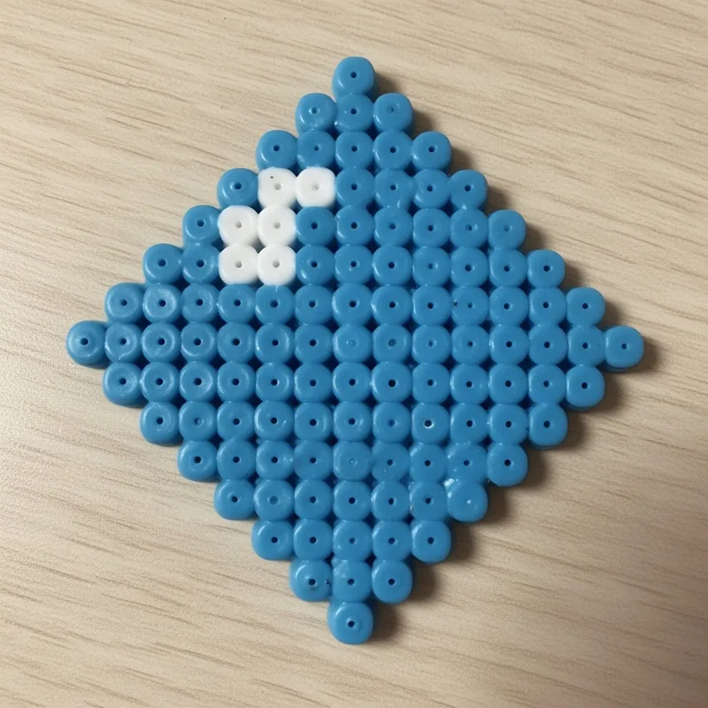 Diamond beaded in fuse beads, 29x29 pegs