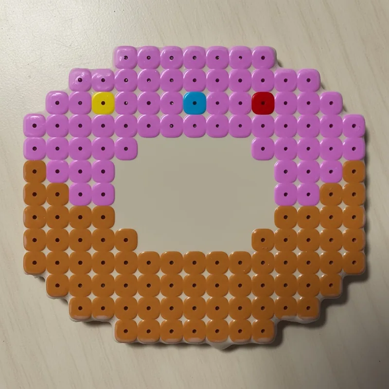 Donut beaded in fuse beads, 29x29 pegs