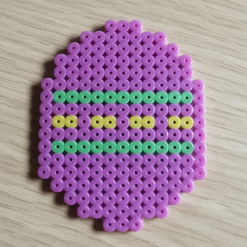 Easter egg beaded in fuse beads, 29x29 pegs