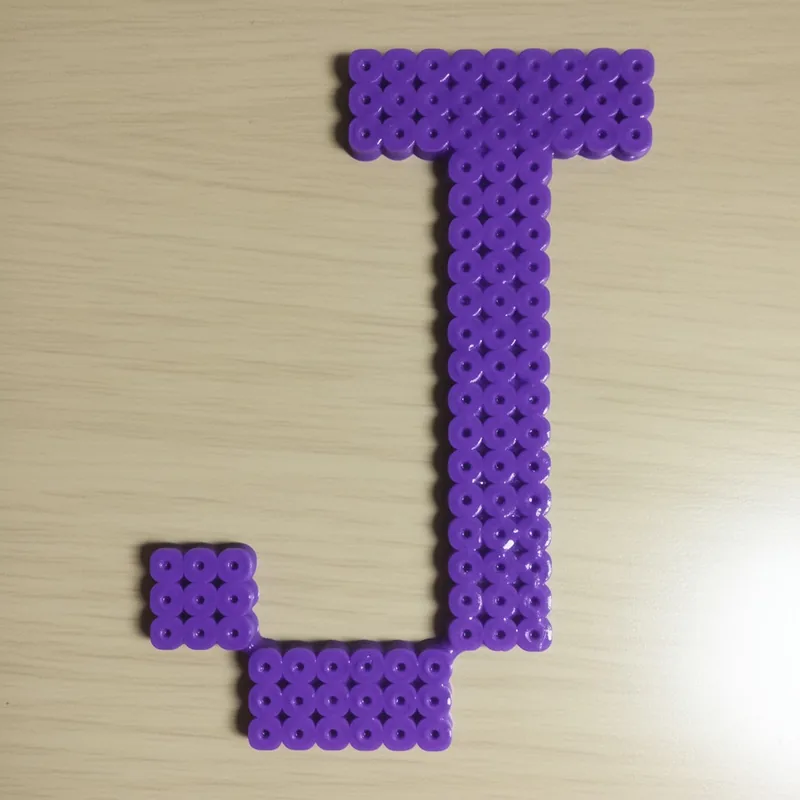 Letter J beaded in fuse beads, 29x29 pegs