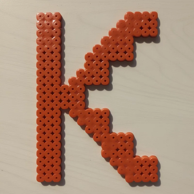 Letter K beaded in fuse beads, 29x29 pegs