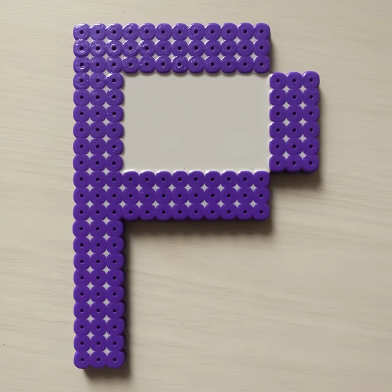 Letter P beaded in fuse beads, 29x29 pegs