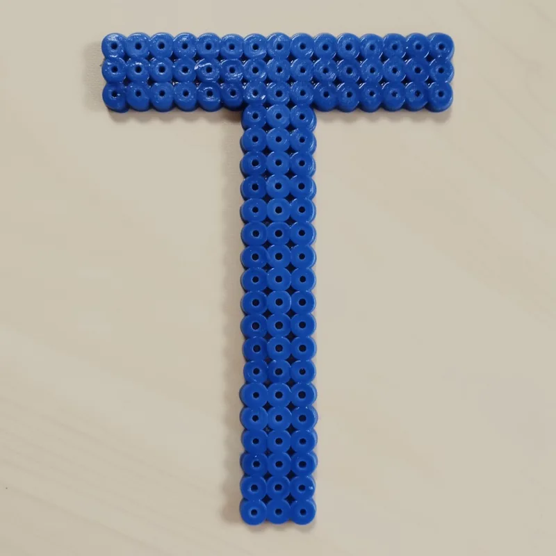 Letter T beaded in fuse beads, 29x29 pegs