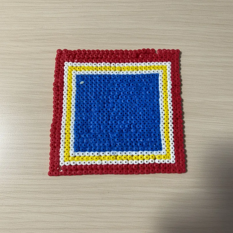 Photo frame beaded in fuse beads, 29x29 pegs