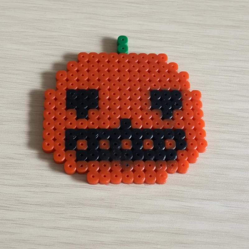 Pumpkin beaded in fuse beads, 29x29 pegs