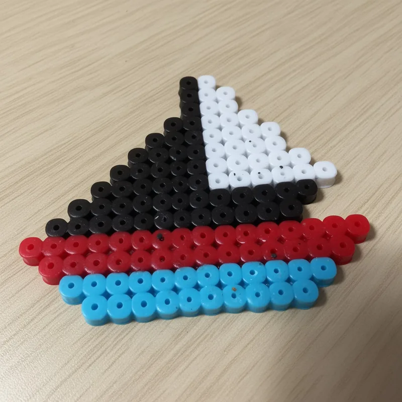 Sailboat beaded in fuse beads, 29x29 pegs