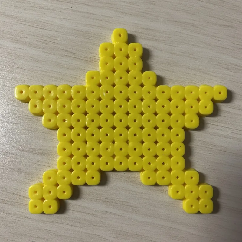 Star beaded in fuse beads, 29x29 pegs